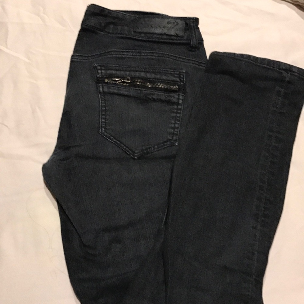 Black skinny moto jeans